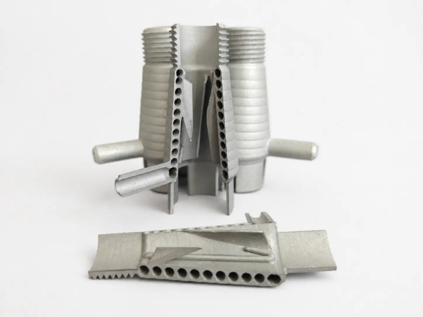 Sectioned metal part with internal cooling channels